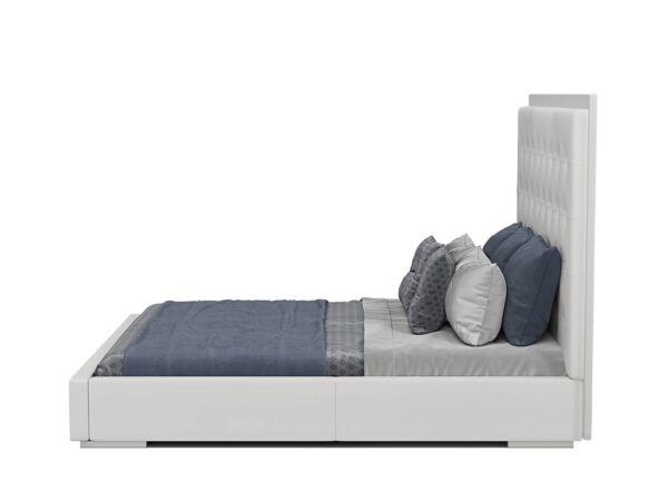 White upholstered bed
